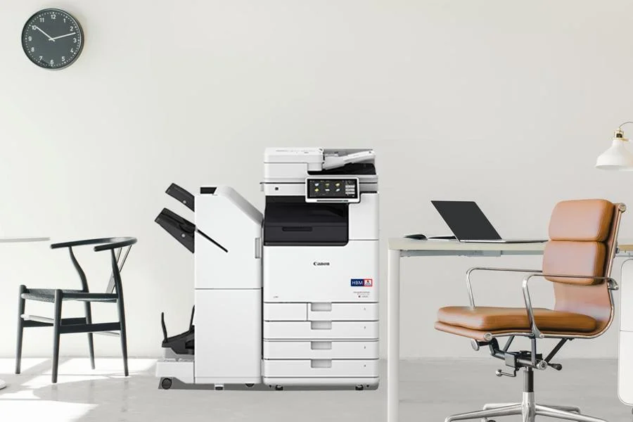 imageRUNNER ADVANCE DX C3935i in the office with 4 paper drawers and saddle stitch finisher